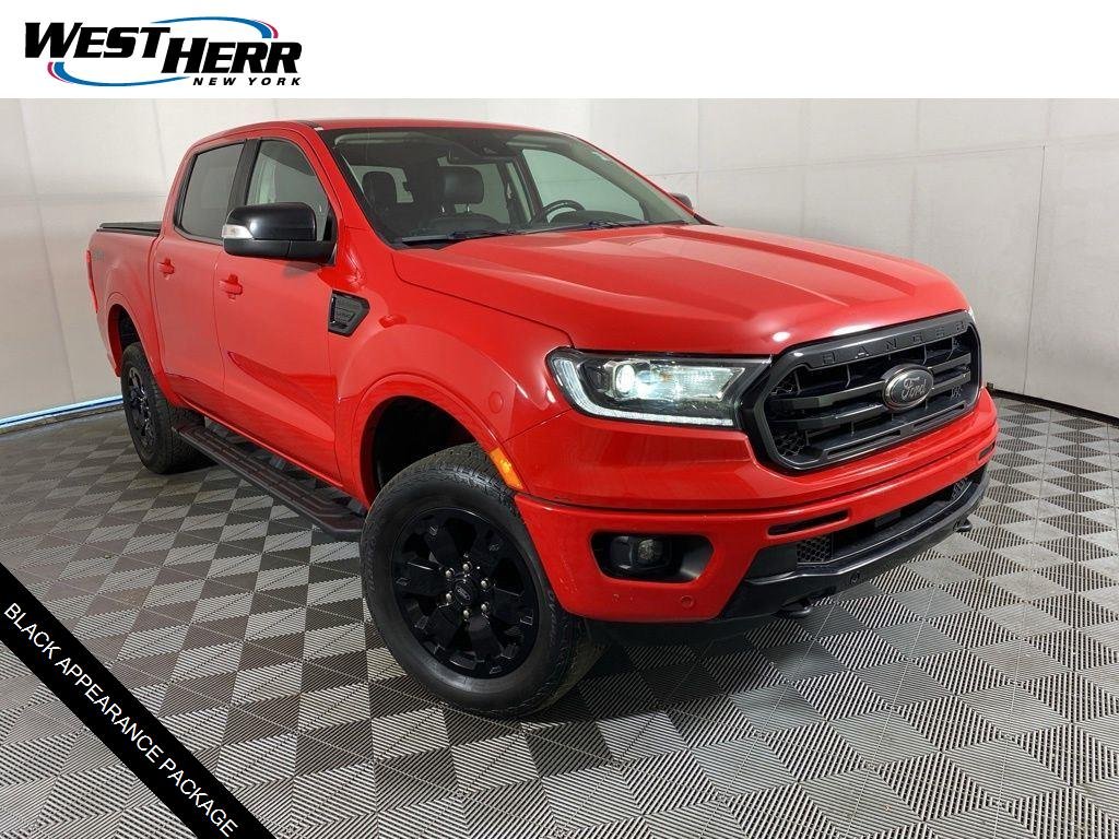 Used 2021 Rapid Red Metallic Tinted Clea Ford Lariat image 1