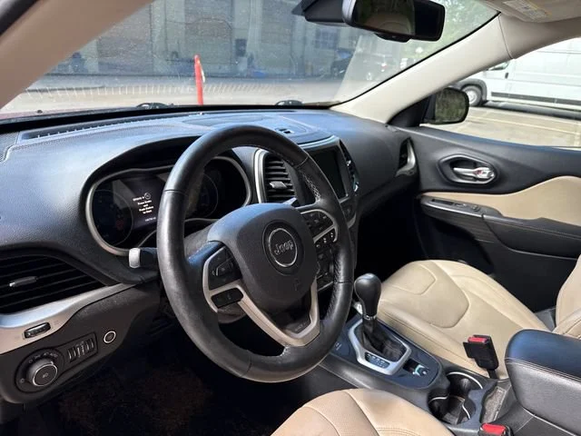 Used 2015 Deep Cherry Red Crystal Pearlcoat Jeep Limited image 17