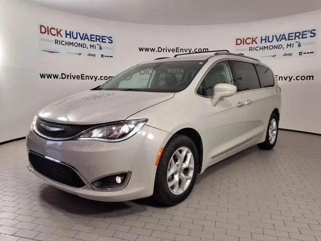 Used 2017 White Chrysler Touring L Plus image 1