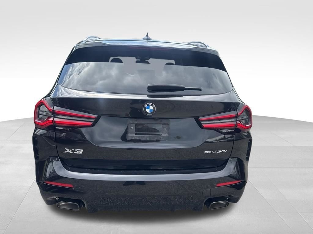 Used 2024 Black BMW sDrive30i image 4