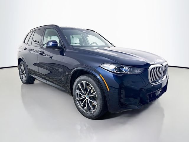 Used 2026 Carbon Black Metallic BMW xDrive40i image 1