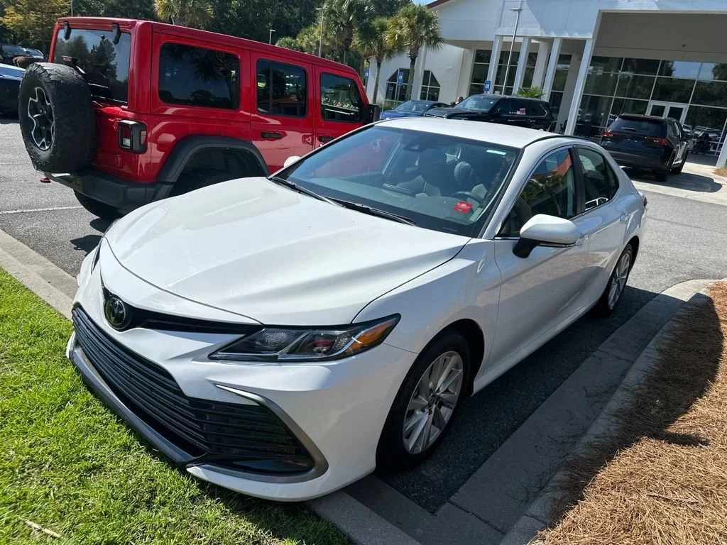 Used 2024 White Toyota LE image 1