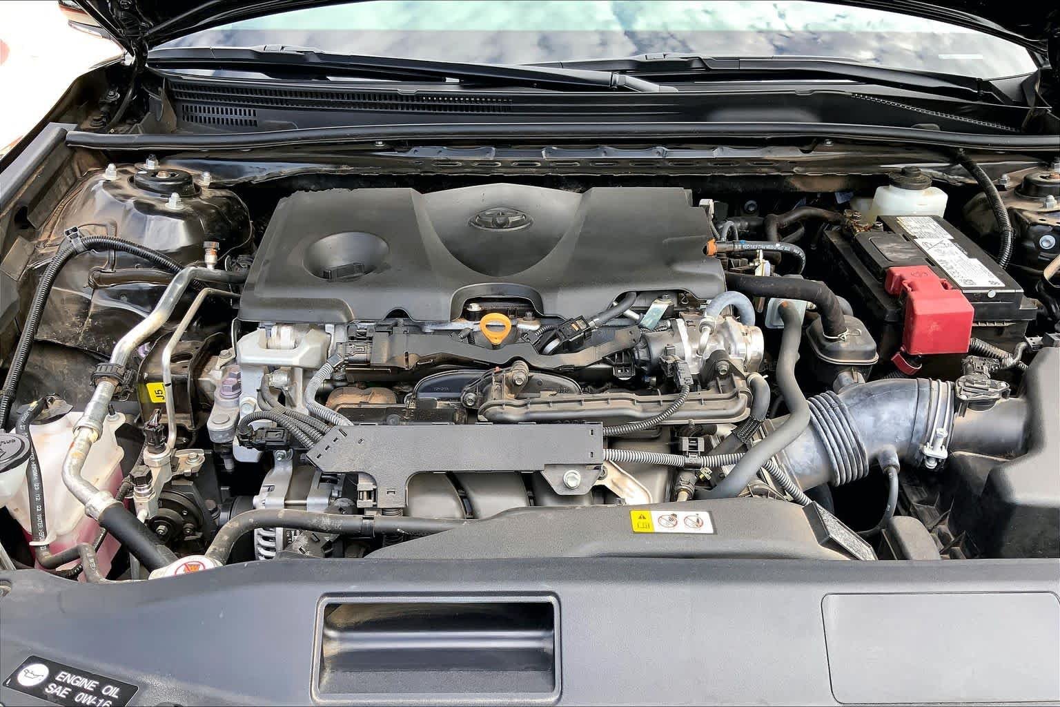 Used 2024 Midnight Black Metallic Toyota LE image 29