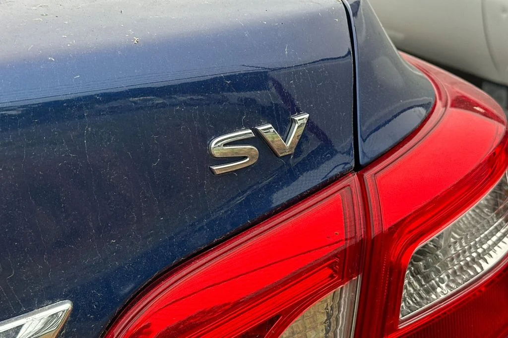 Used 2016 Deep Blue Pearl Nissan SV image 8