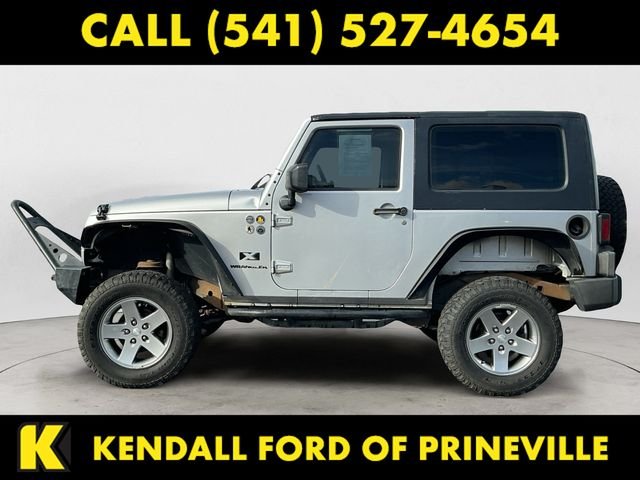Used 2009 Jeep Wrangler X with VIN 1J4FA24129L713655 for sale in Bend, OR