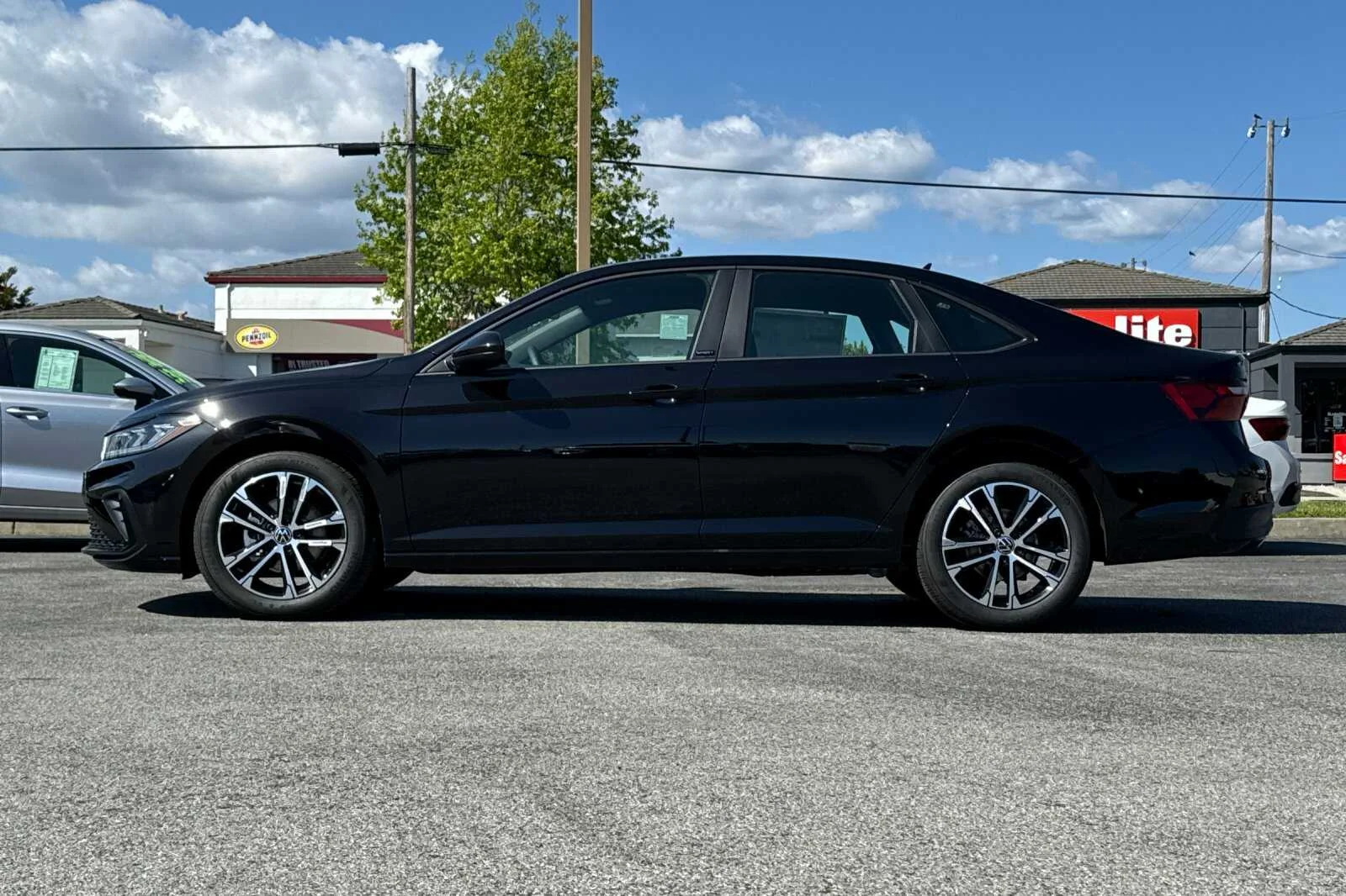 New 2026 Black Volkswagen 1.5T Sport image 7