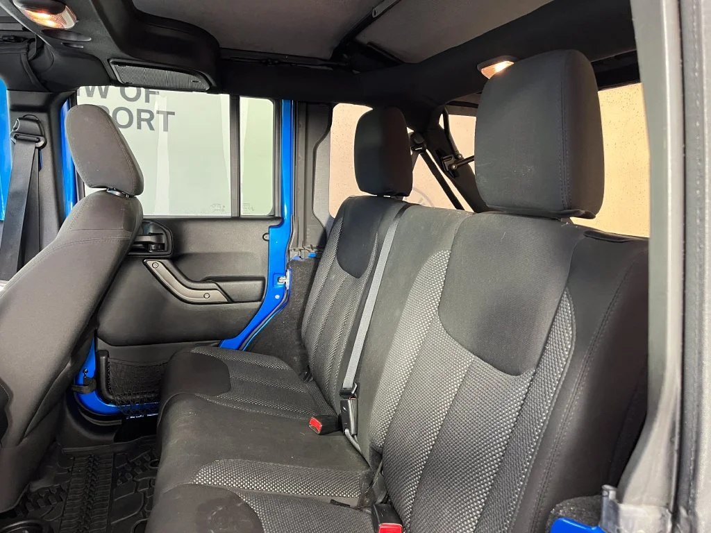 Used 2016 Blue Pearl Jeep Unlimited Sport image 4