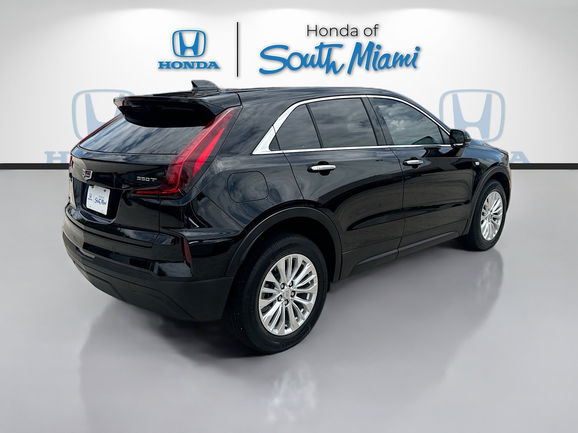 Used 2024 Stellar Black Metallic Cadillac FWD Luxury image 7