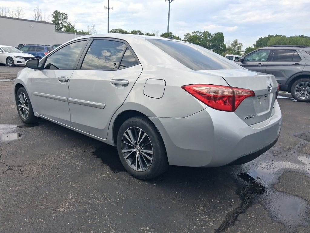Used 2019 Classic Silver Metallic Toyota LE image 2