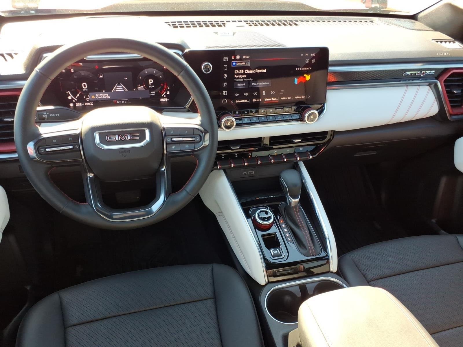 Used 2024 Volcanic Red Tintcoat GMC 4WD AT4X image 22