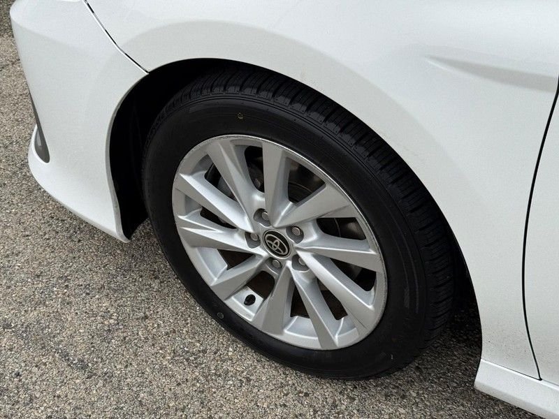 Used 2021 Super White Toyota LE image 10