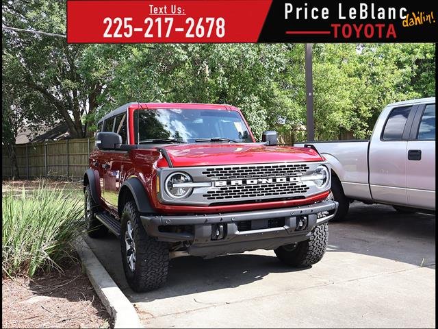 Used 2025 Ruby Red Metallic Tinted Clearcoat Ford Badlands image 1