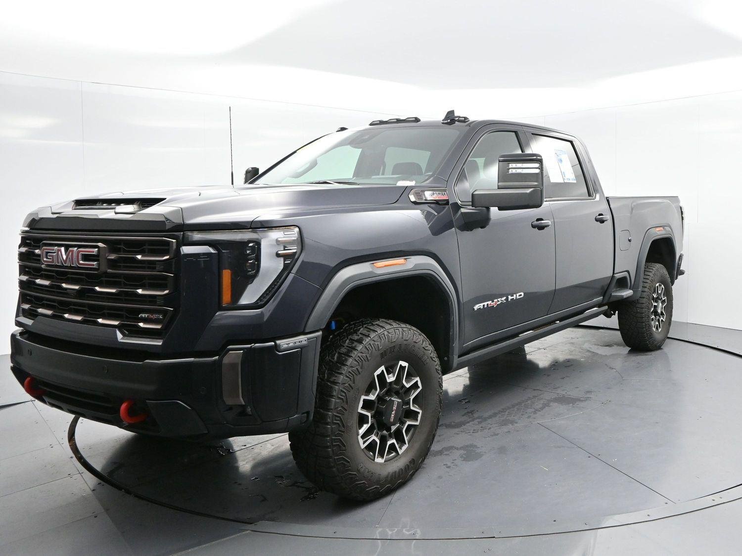 Used 2024 Titanium Rush Metallic GMC AT4X image 3