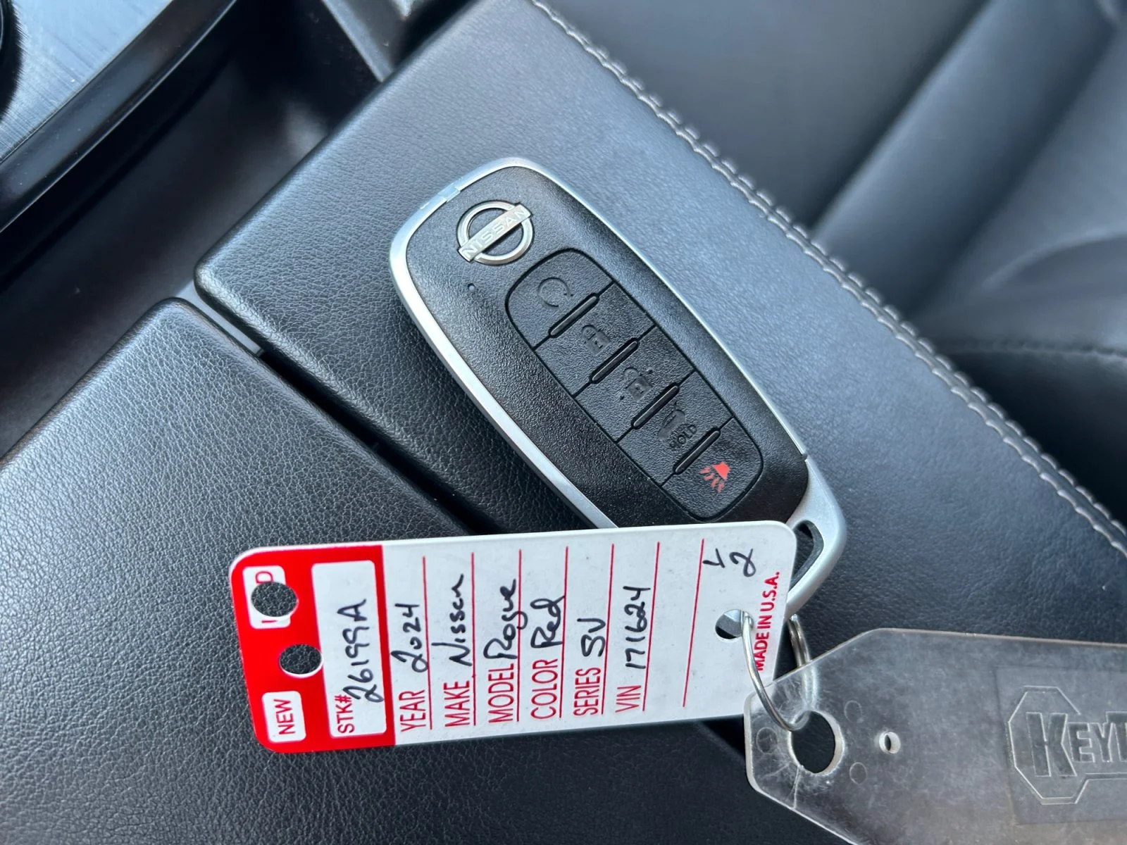 Used 2024 RED METALLIC Nissan SV Moonroof AWD image 27