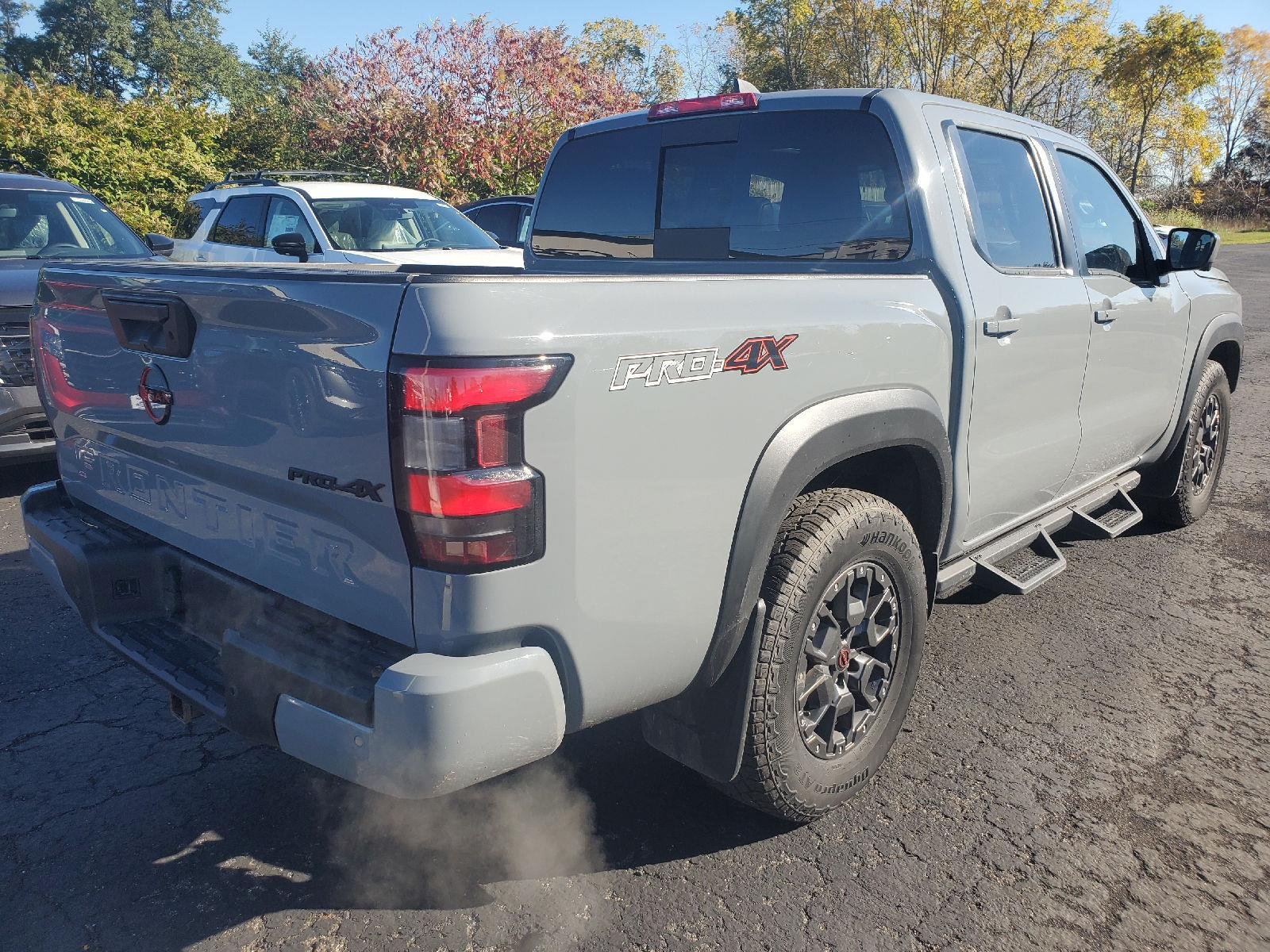 Used 2023 Boulder Gray Pearl Nissan PRO-4X image 2