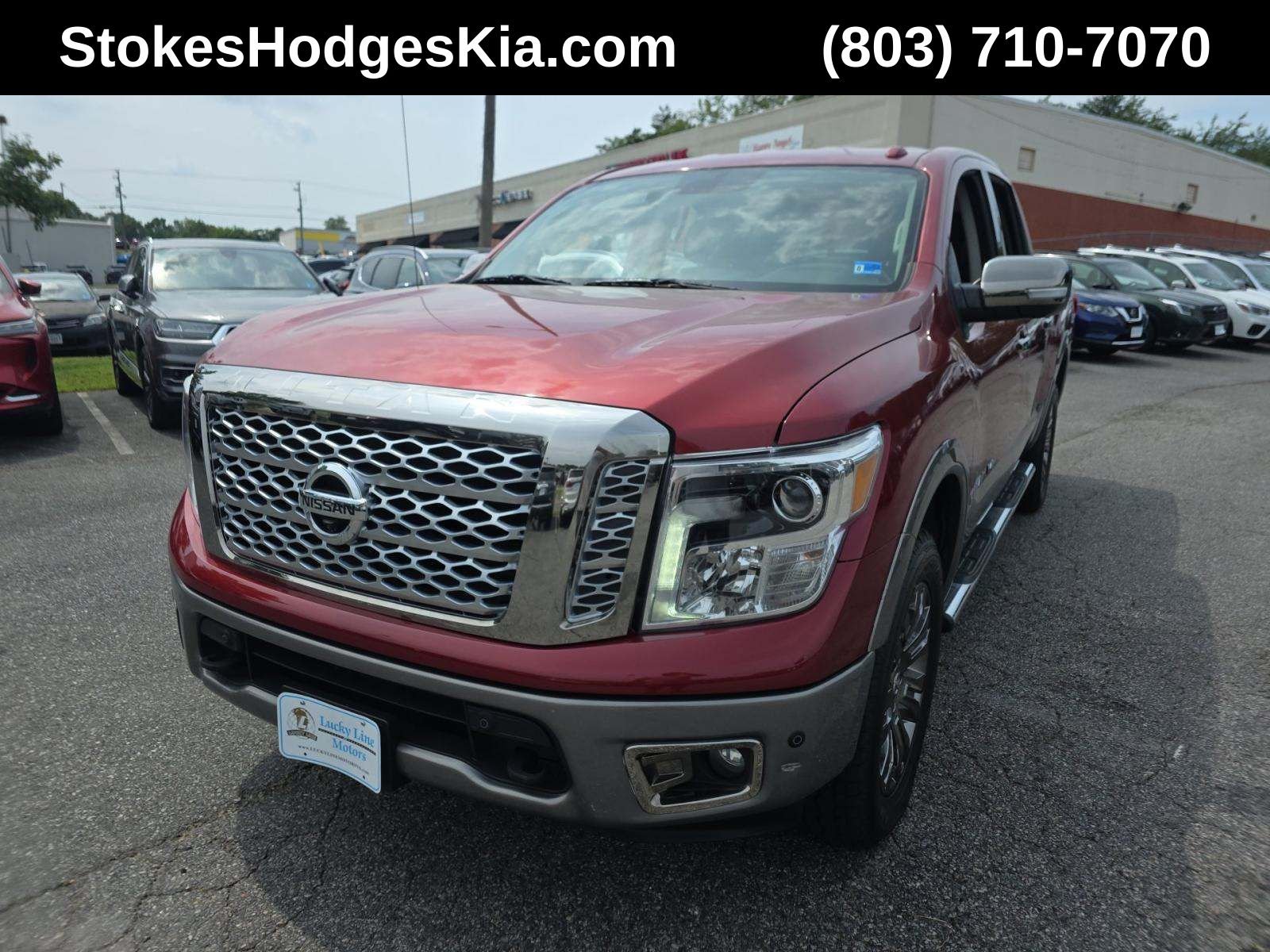 Used 2019 Red Nissan Platinum Reserve image 1