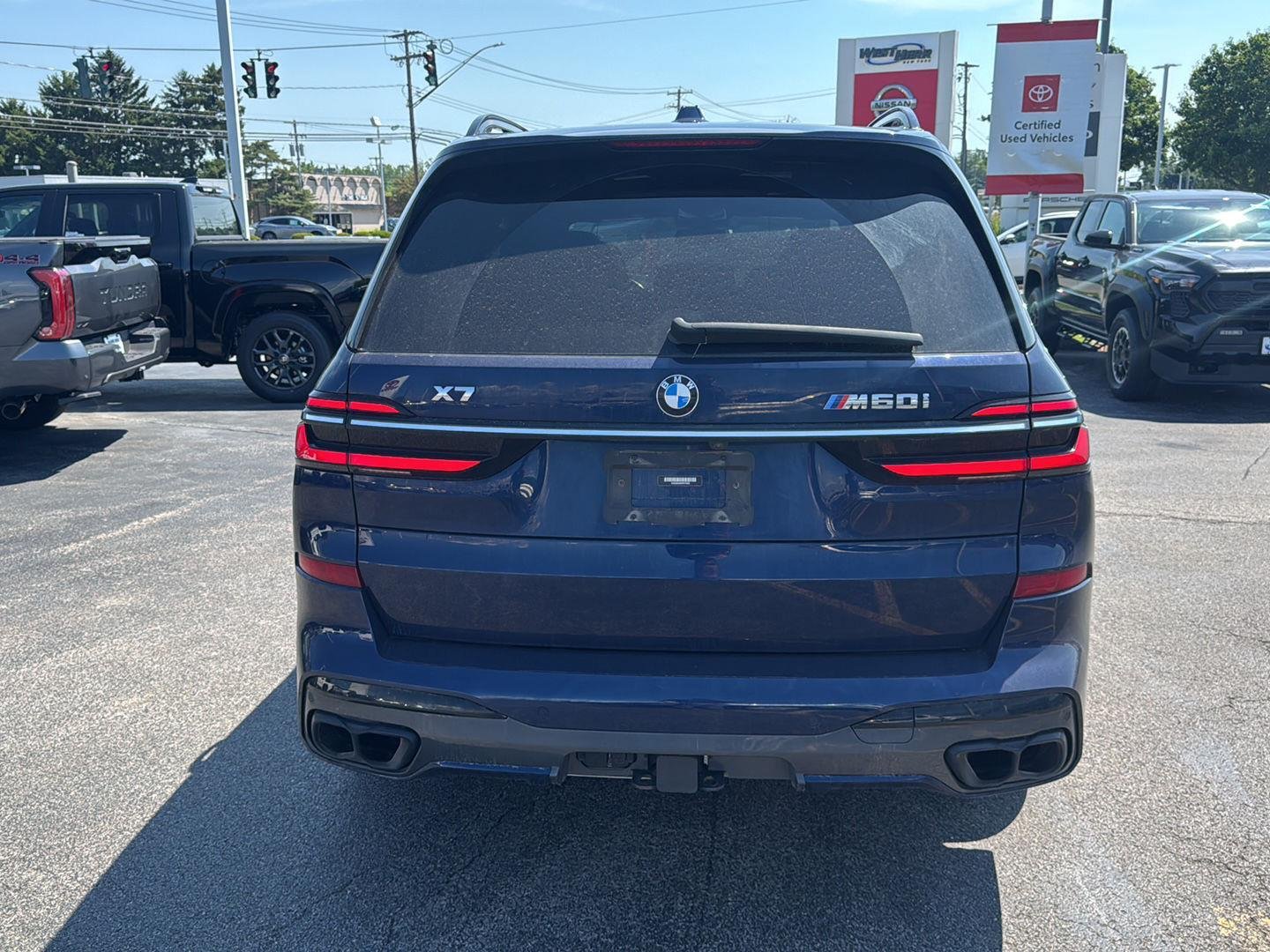 Used 2023 Tanzanite Blue II Metallic BMW M60i image 5