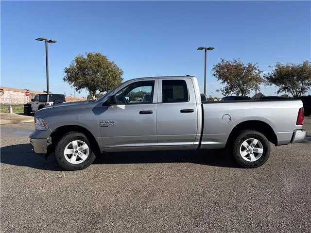 Used 2024 Granite Crystal Metallic Clearcoat RAM SLT 4x4 Quad Cab 6.3 ft. box 140 in. WB image 4