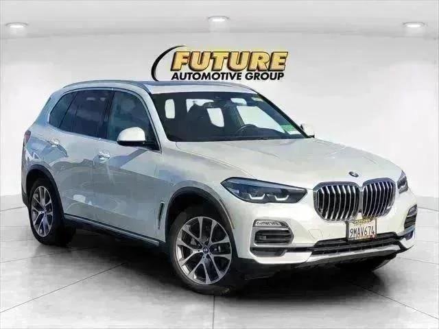 Certified Used 2019 White BMW xDrive40i image 1