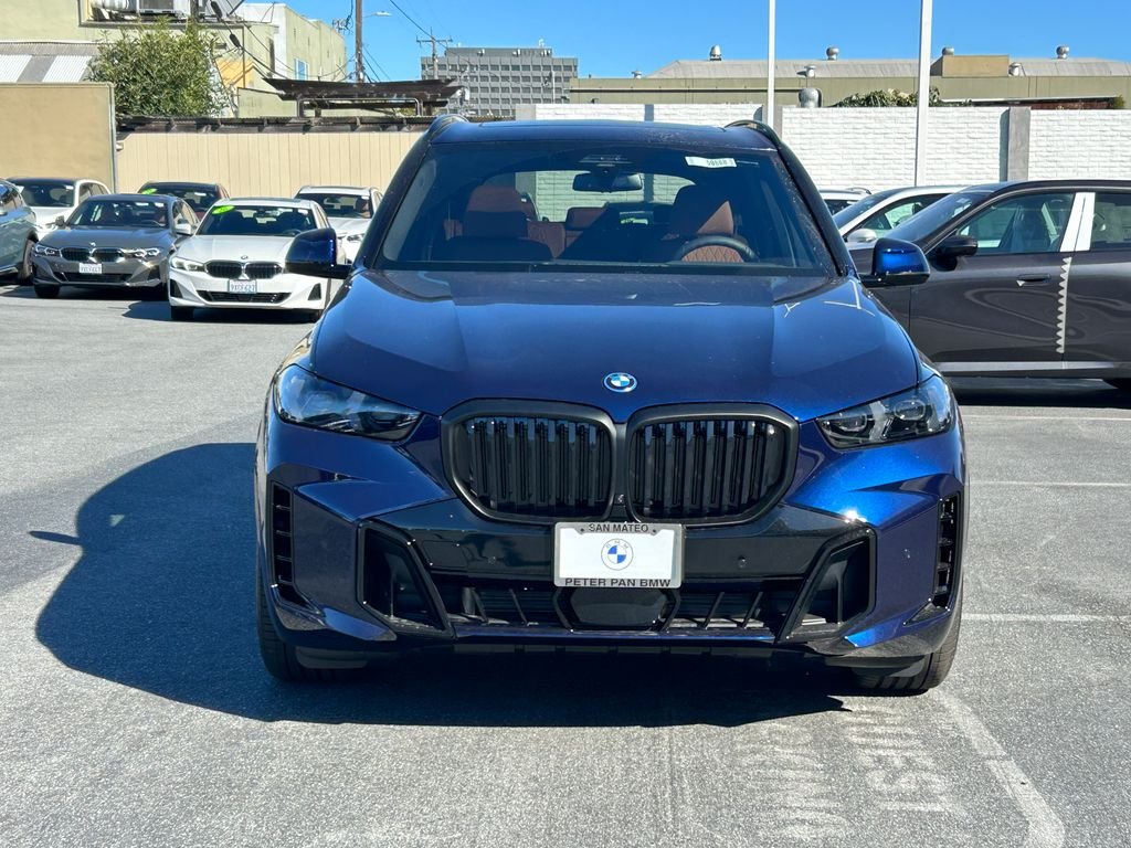 New 2026 Tanzanite Blue II Metallic BMW xDrive50e image 8