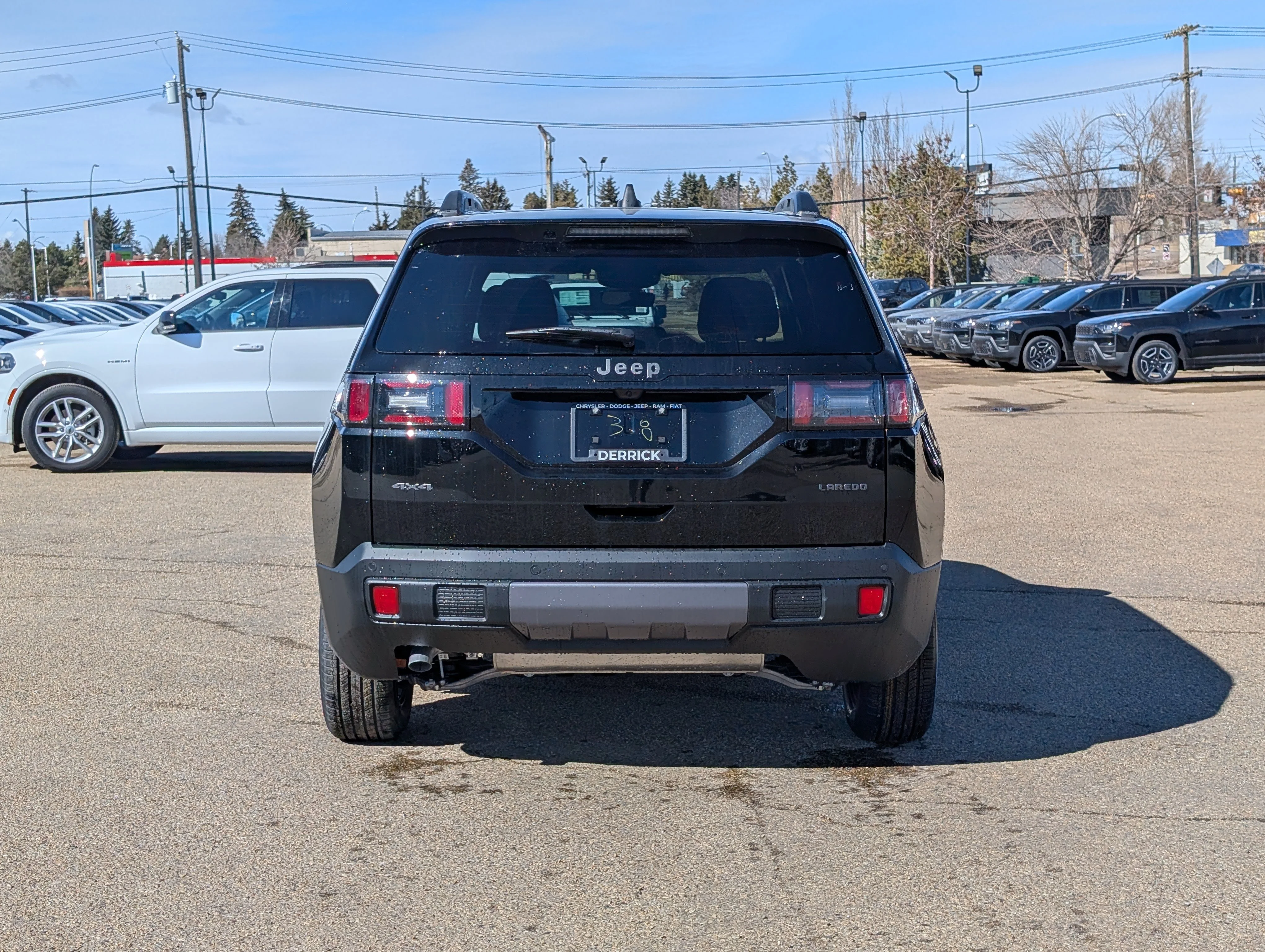 New 2026 Diamond Black Crystal Pearl Jeep Laredo image 5