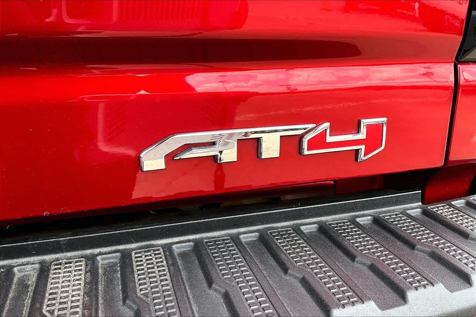 Used 2025 Volcanic Red Tintcoat GMC AT4 image 10