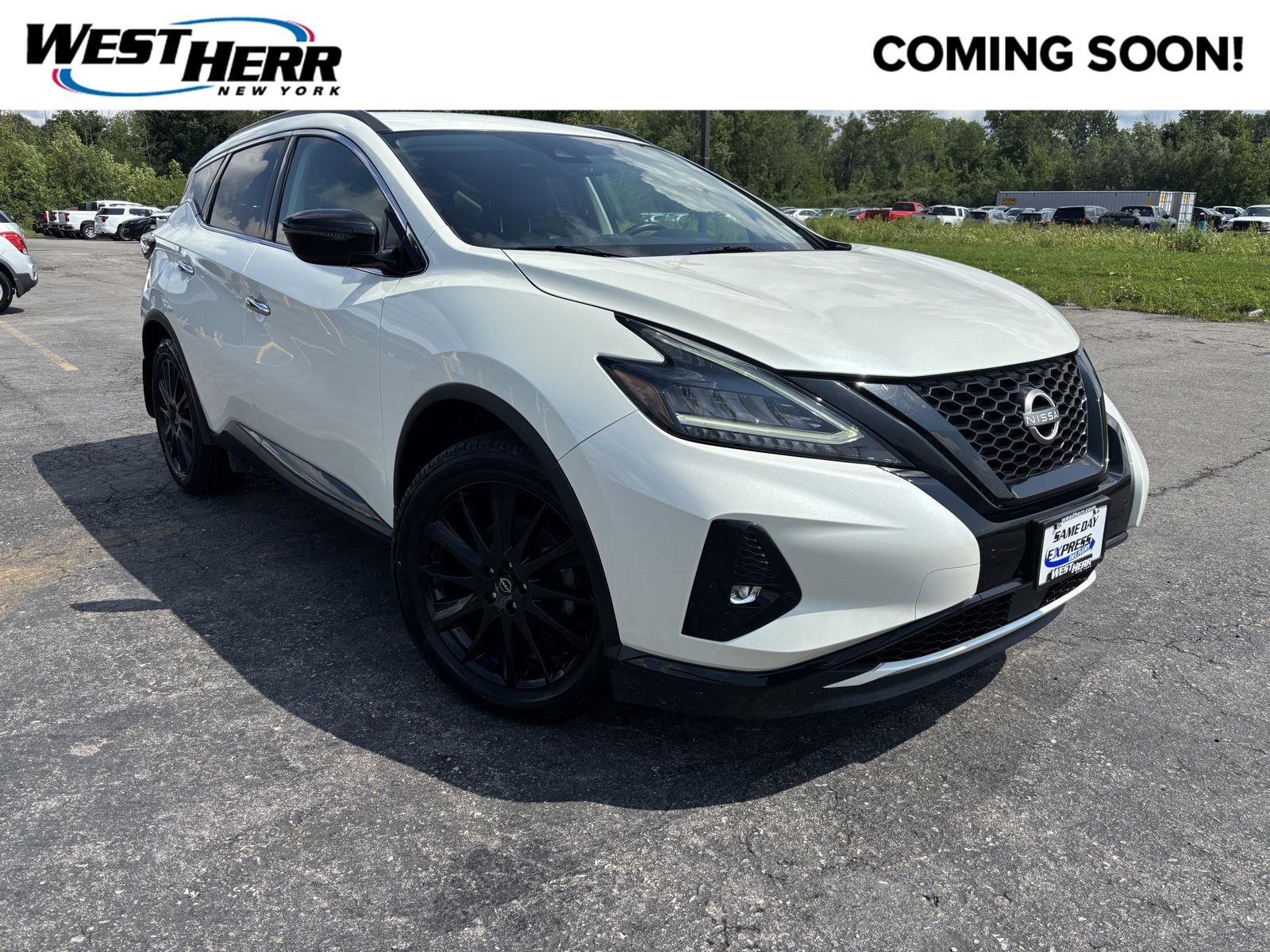 Used 2023 Pearl White Tricoat Nissan SV image 1
