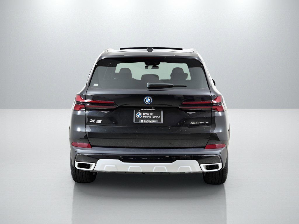 Used 2026 Black Sapphire Metallic BMW xDrive50e image 11