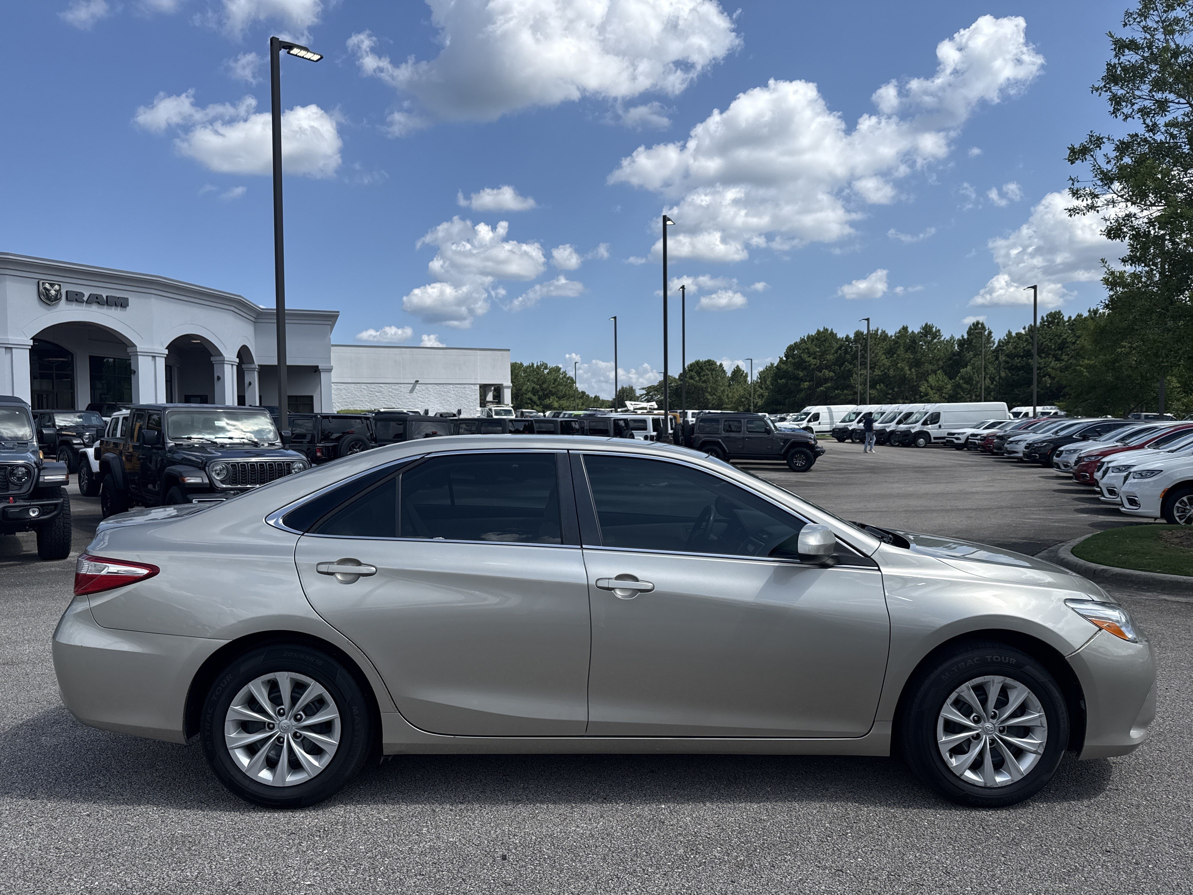 Used 2015 Gold Toyota LE image 8