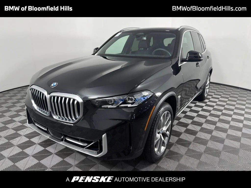 Certified Used 2024 Black Sapphire Metallic BMW xDrive40i image 1