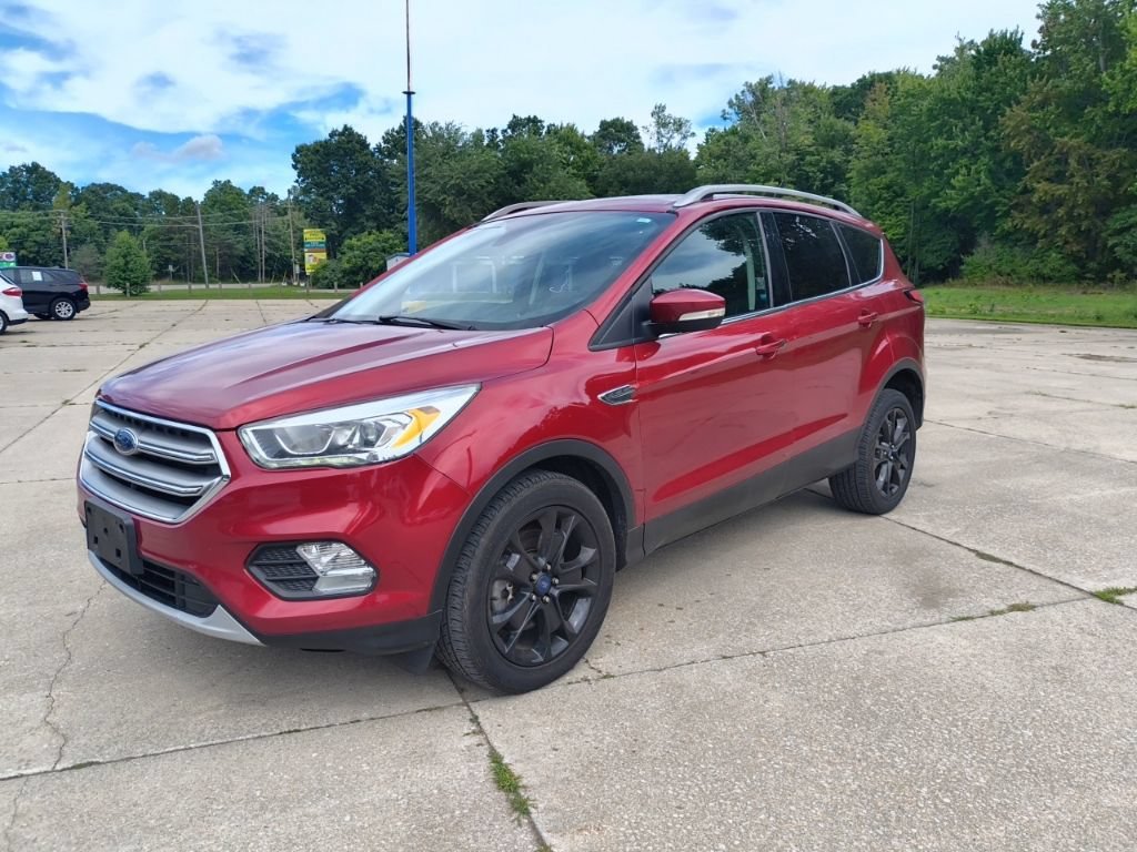 Used 2017 Red Ford Titanium image 1