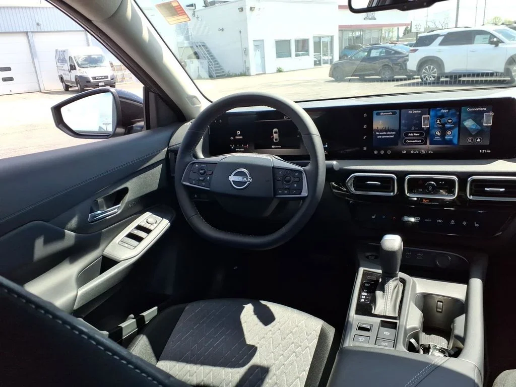 New 2026 Gun Metallic Nissan SV image 6