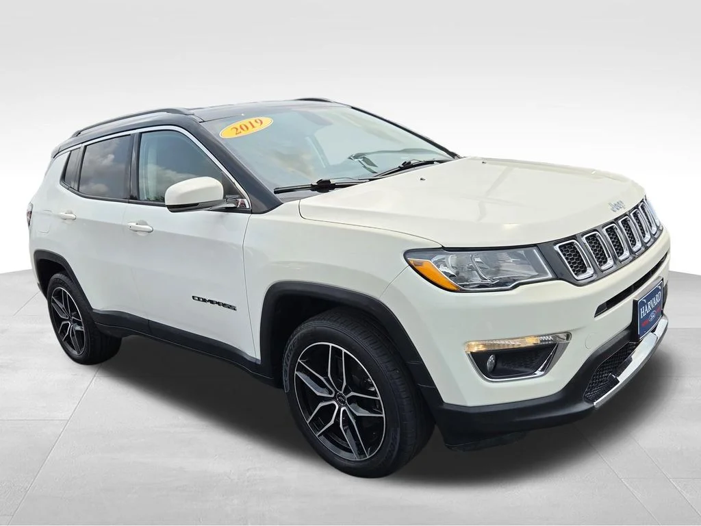 Used 2019 White Clearcoat Jeep Limited image 1