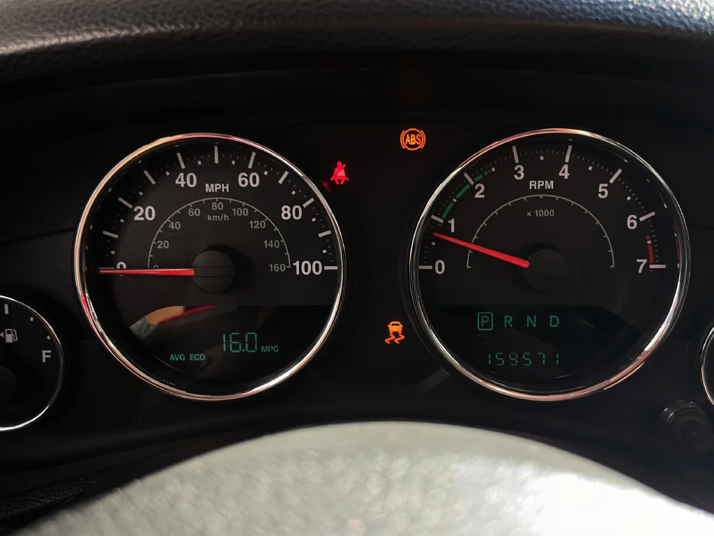 Used 2013 Red Jeep Unlimited Sport image 23