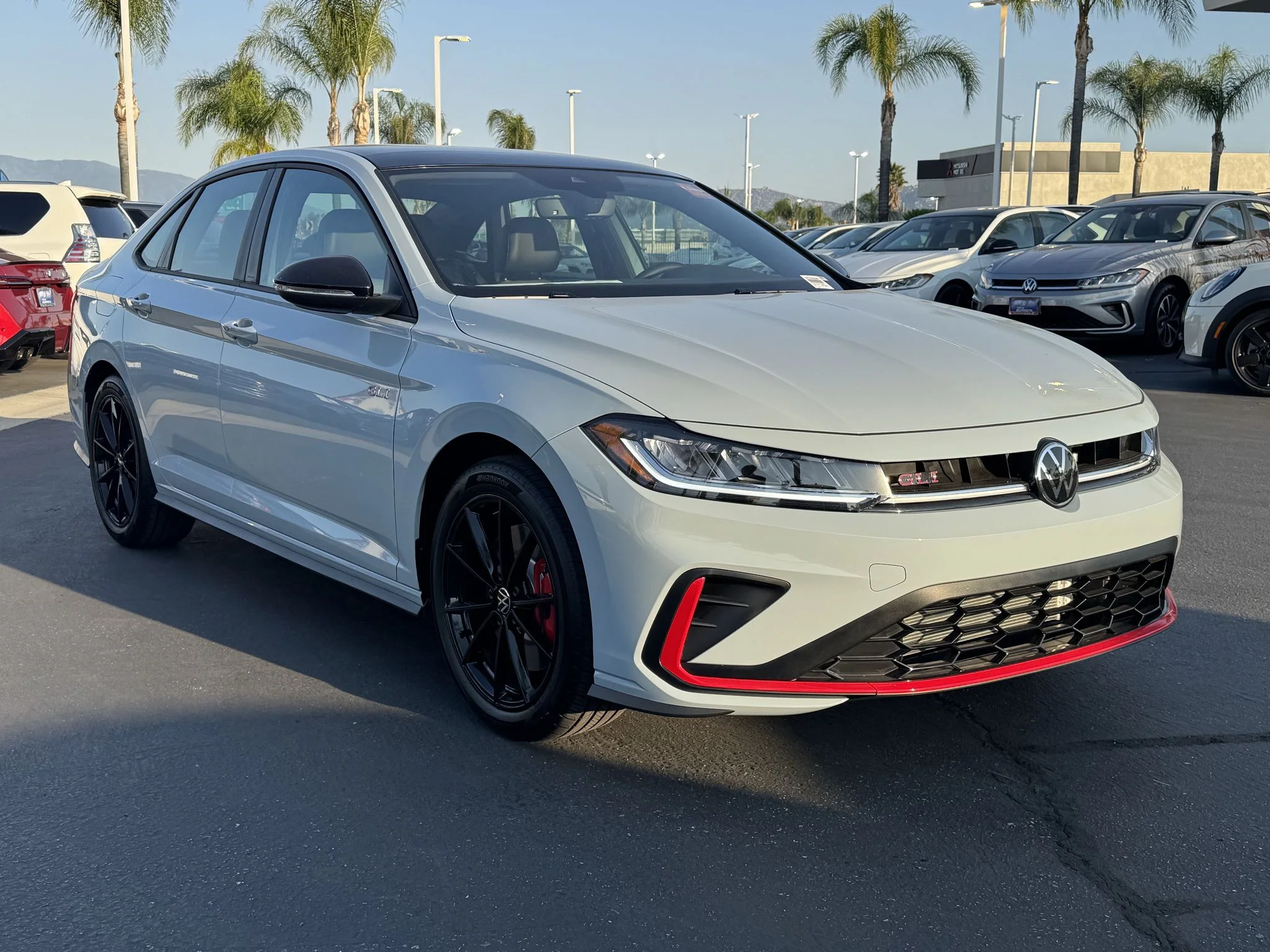 New 2026 Monument Gray w/Deep Black Roof Volkswagen Autobahn image 1