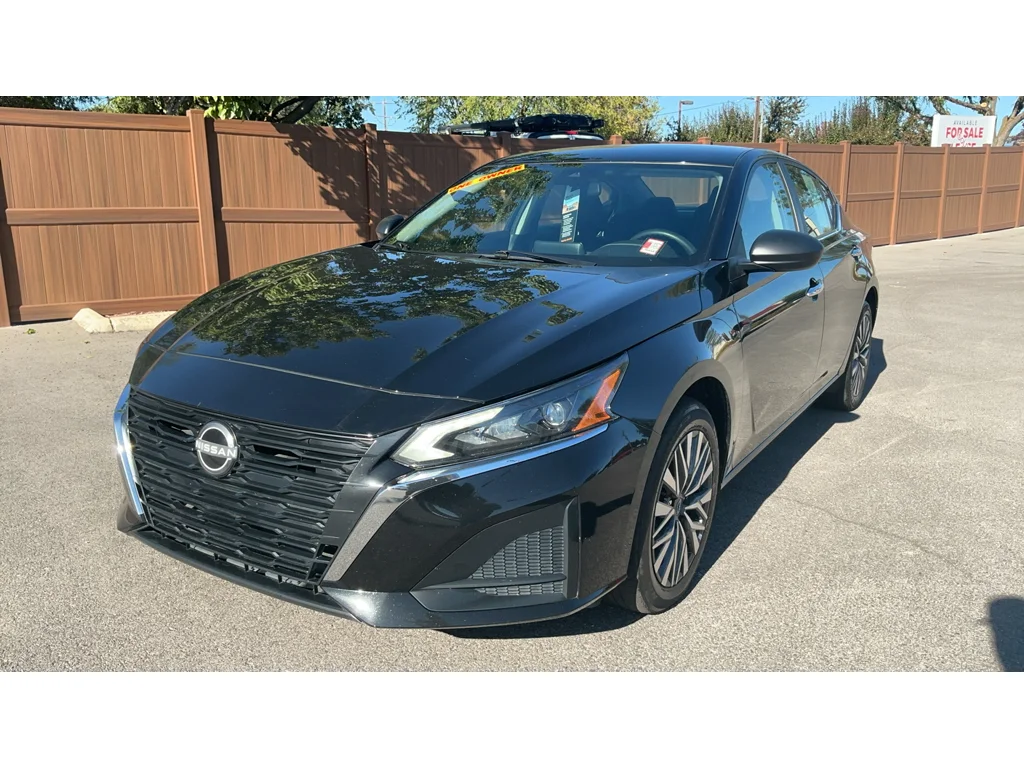 Used 2025 Super Black Nissan SV image 1
