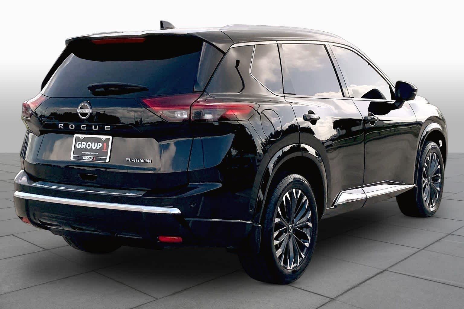 Used 2024 Super Black Nissan Platinum image 13