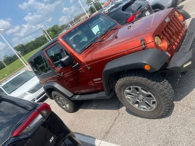Used 2014 Orange Jeep Sport image 4