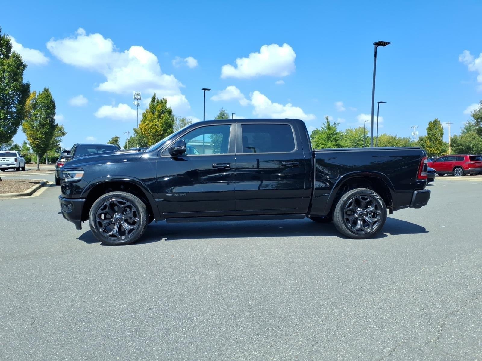 Used 2023 Diamond Black Crystal Pearlcoat Ram Limited image 3