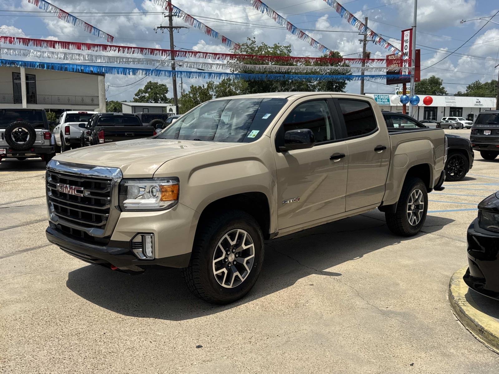 Used 2022 Desert Sand Metallic GMC 4WD AT4 w/Cloth image 3
