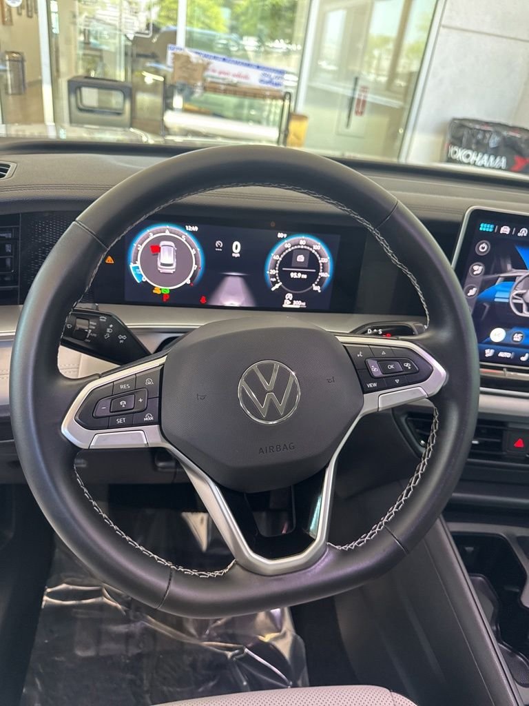 Certified Used 2025 White Volkswagen 2.0T SE image 13