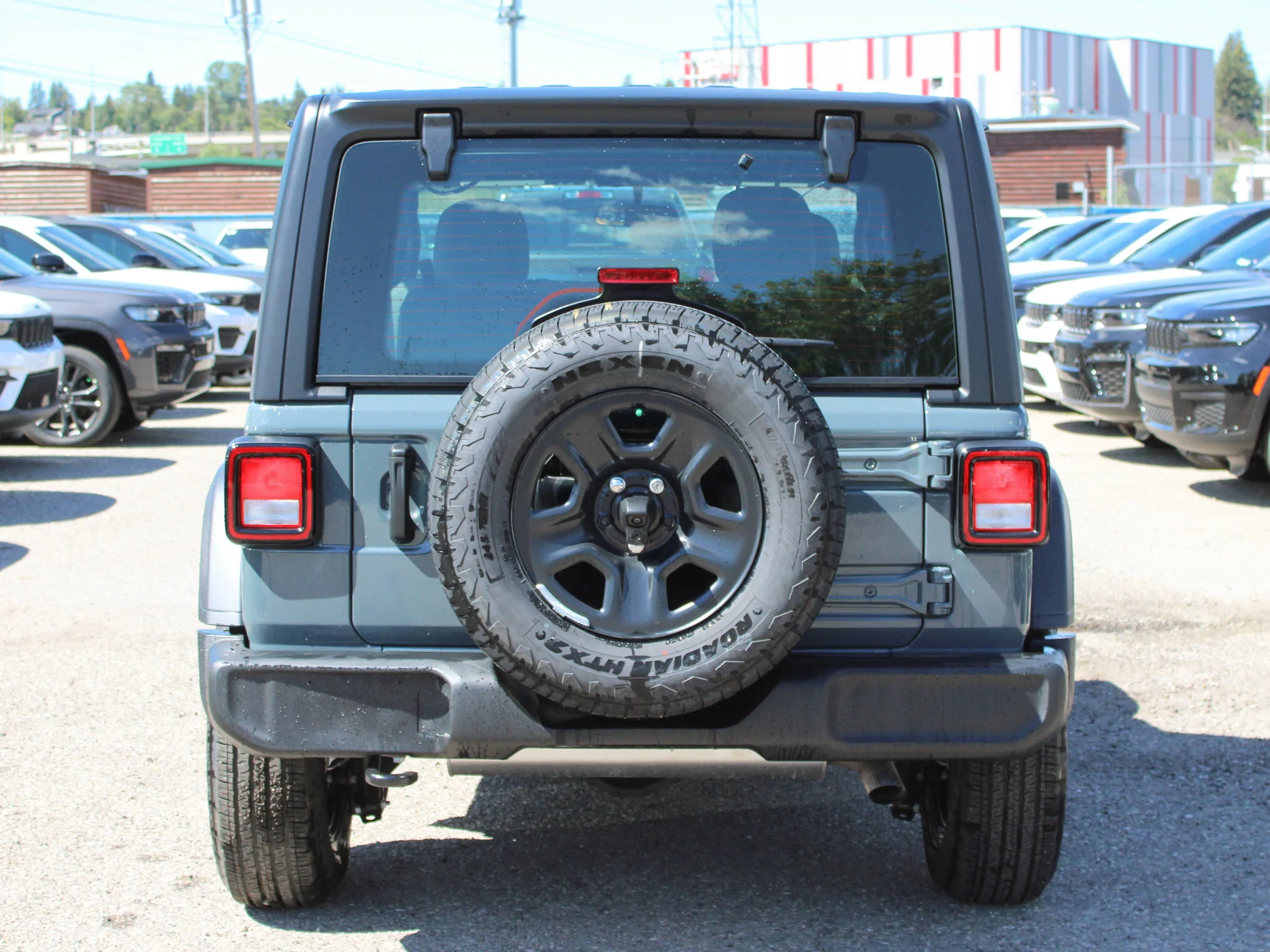 New 2026 Dark blue Jeep Sport* image 3