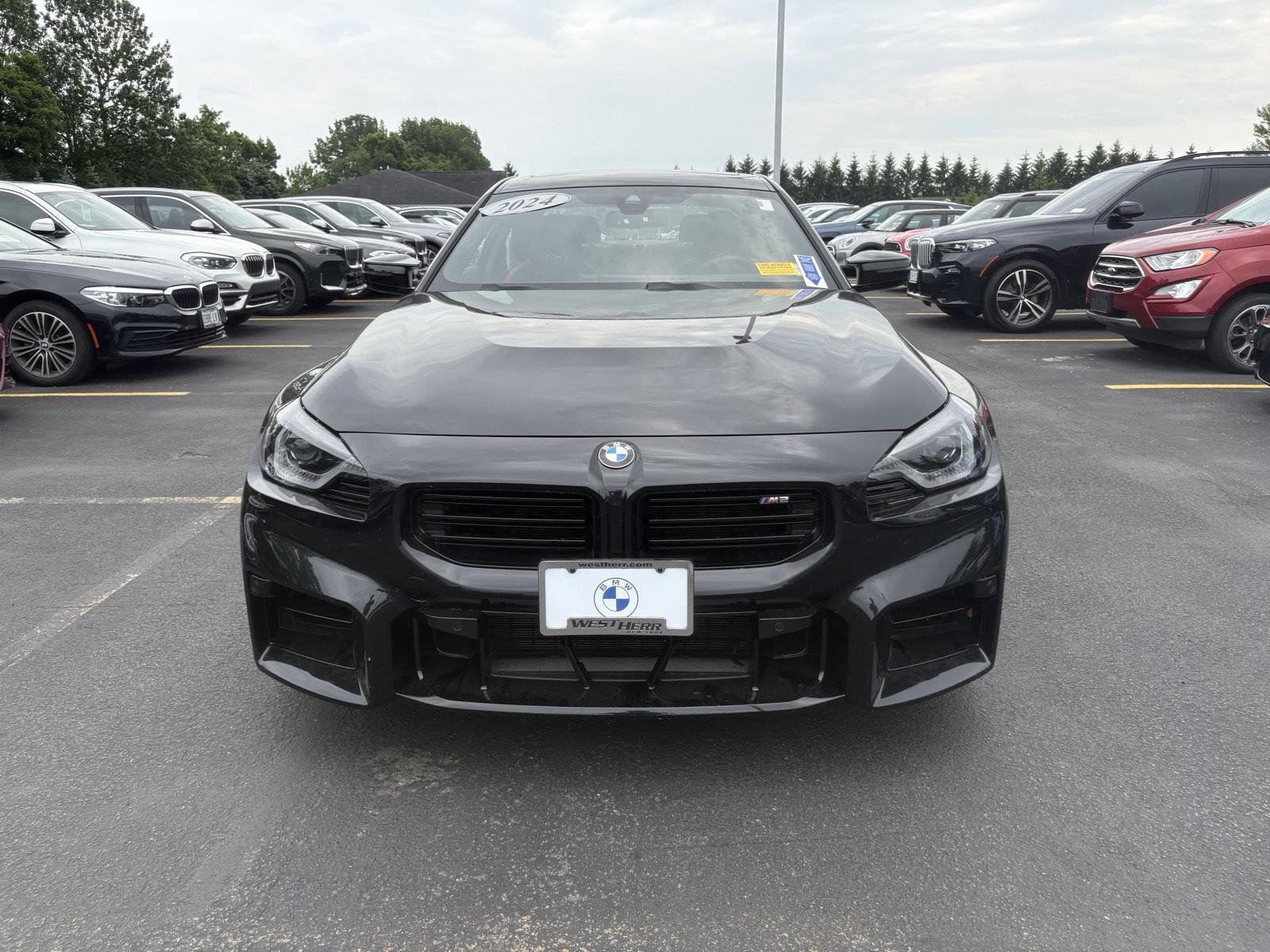 Certified Used 2024 Black Sapphire Metallic BMW M2 Base image 2
