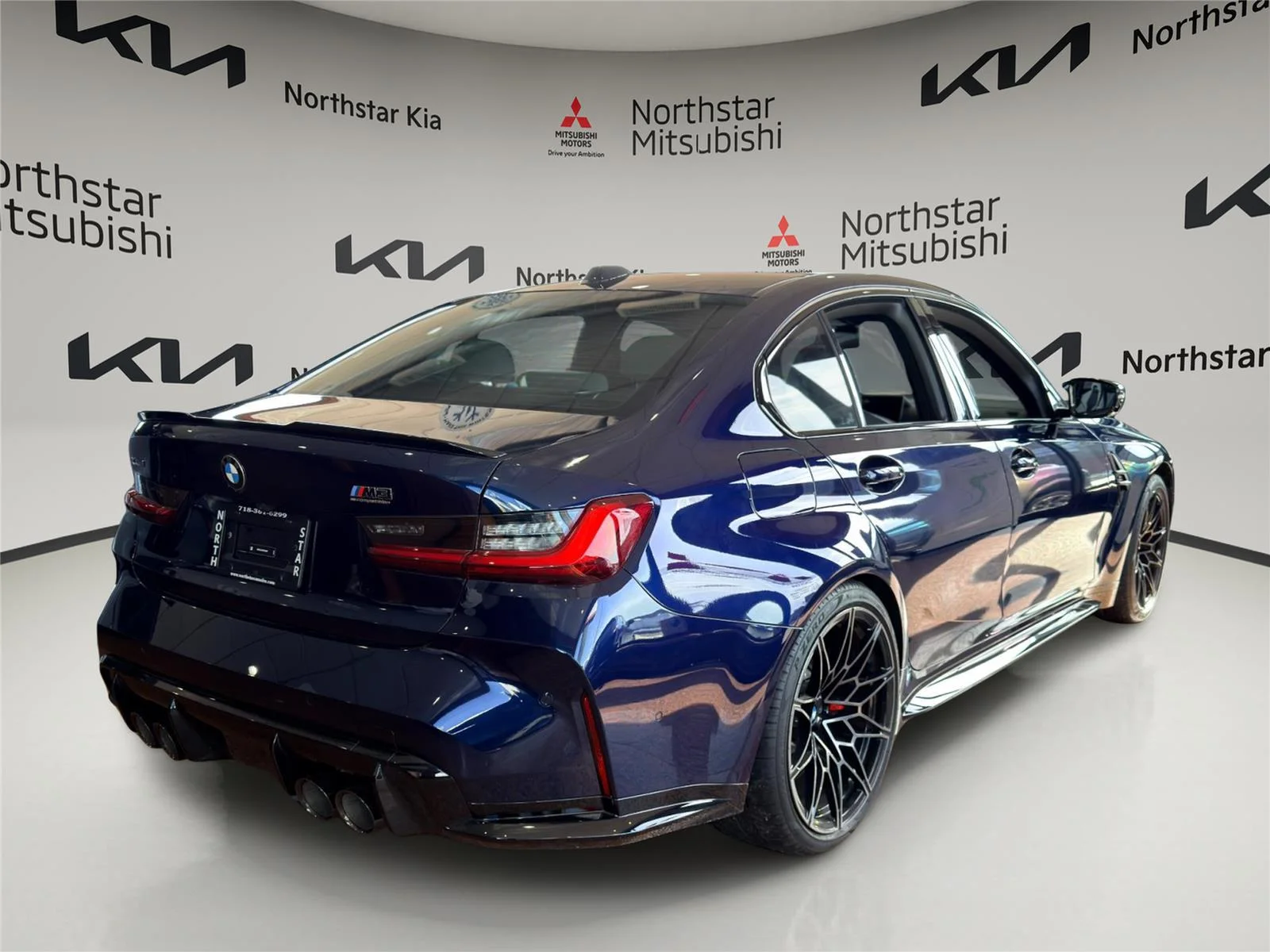 Used 2025 Tanzanite Blue II Metallic BMW Competition xDrive image 4