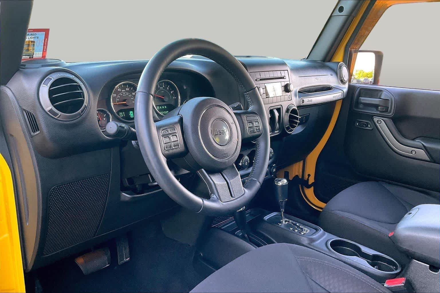 Used 2015 Baja Yellow Clearcoat Jeep Sport image 16