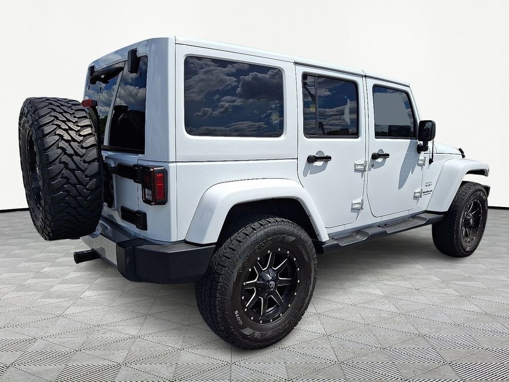 Used 2017 White Jeep Unlimited Sahara image 7