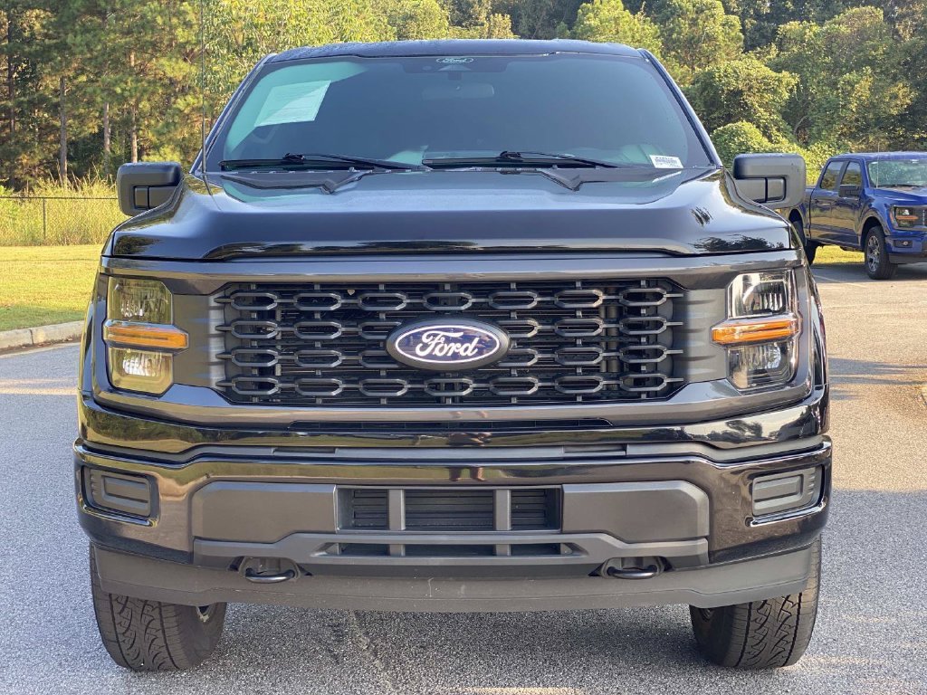 Used 2025 Agate Black Metallic Ford STX image 9
