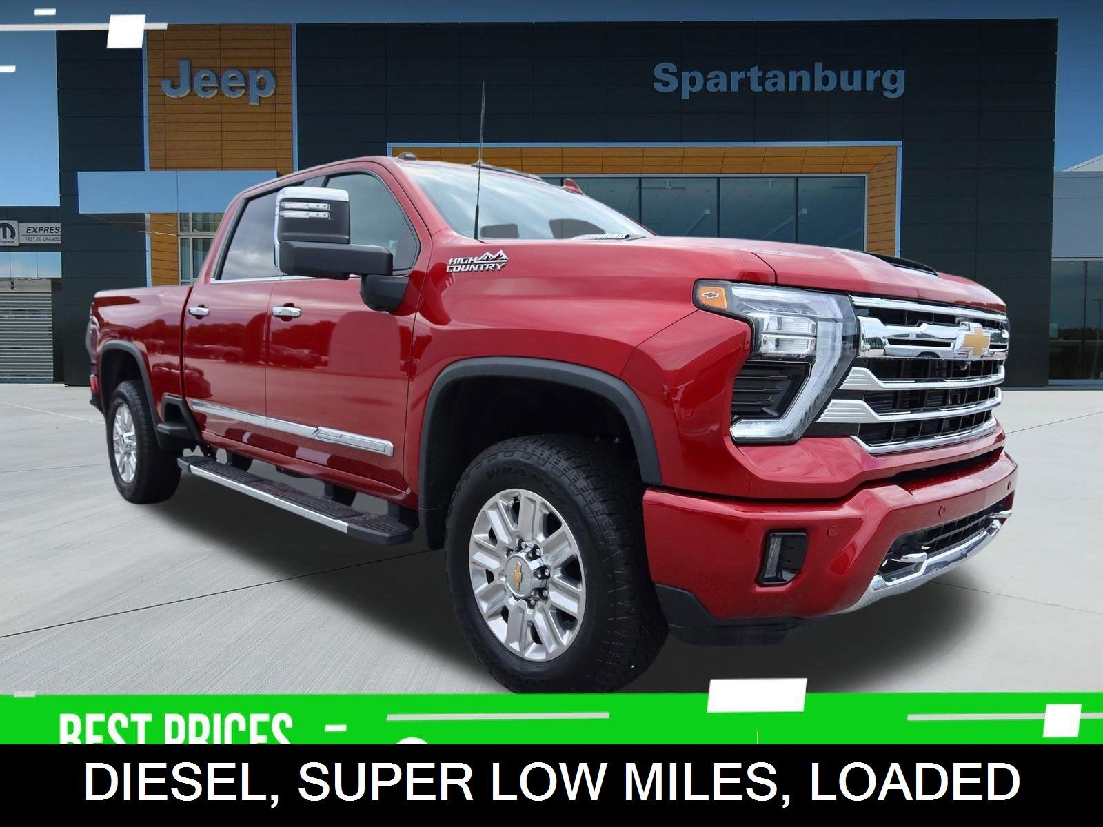 Used 2024 Radiant Red Tintcoat Chevrolet High Country image 1