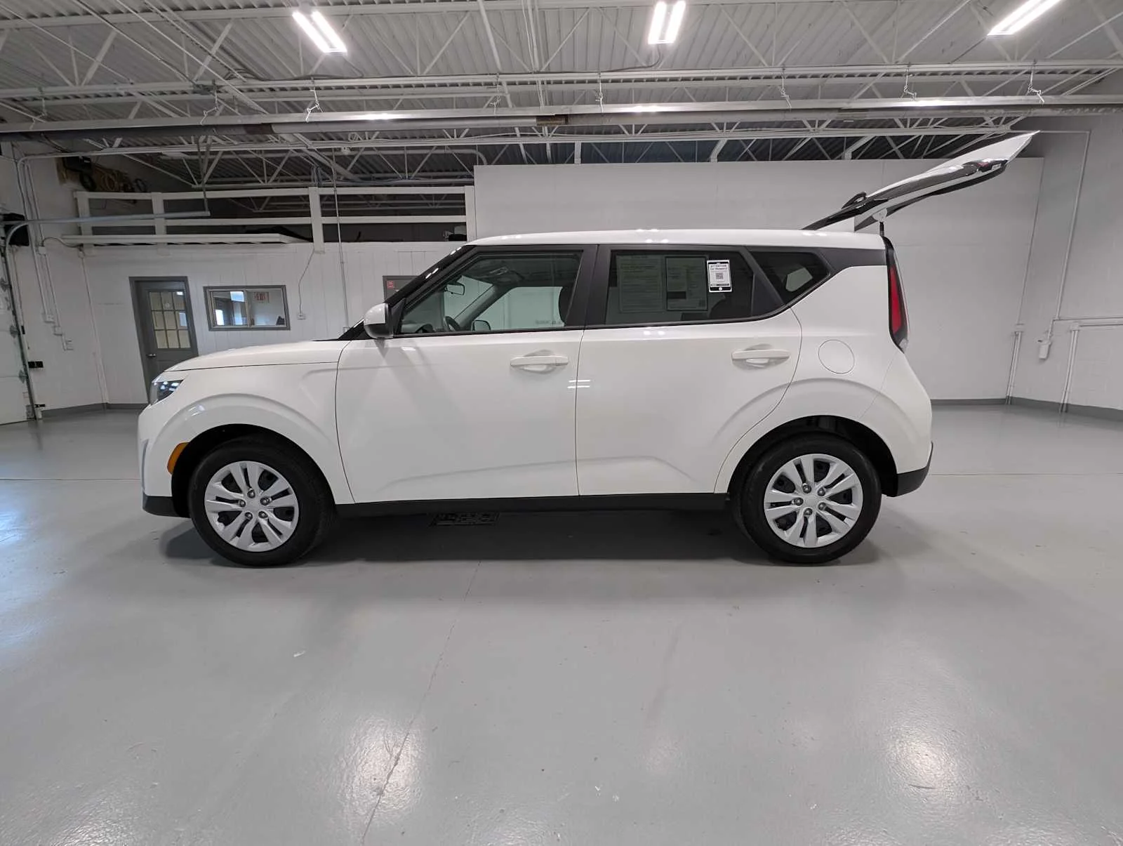 Certified Used 2025 Snow White Pearl Kia LX image 12