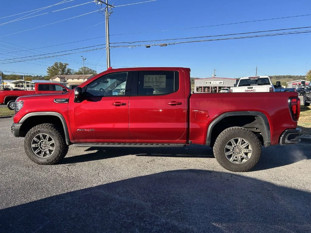 New 2026 VOLCANIC RED TINTCOAT GMC AT4X image 7